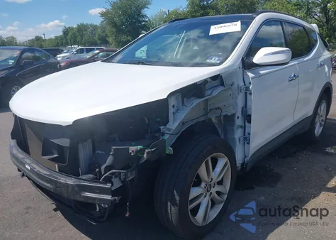 2015 Hyundai Santa Fe Sport 2.0L Turbo z USA, uszkodzony, nr VIN 5XYZWDLA0FG249161